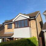 Bespoke Hardie® Plank installation—transforming a traditional dormer into a modern feature.